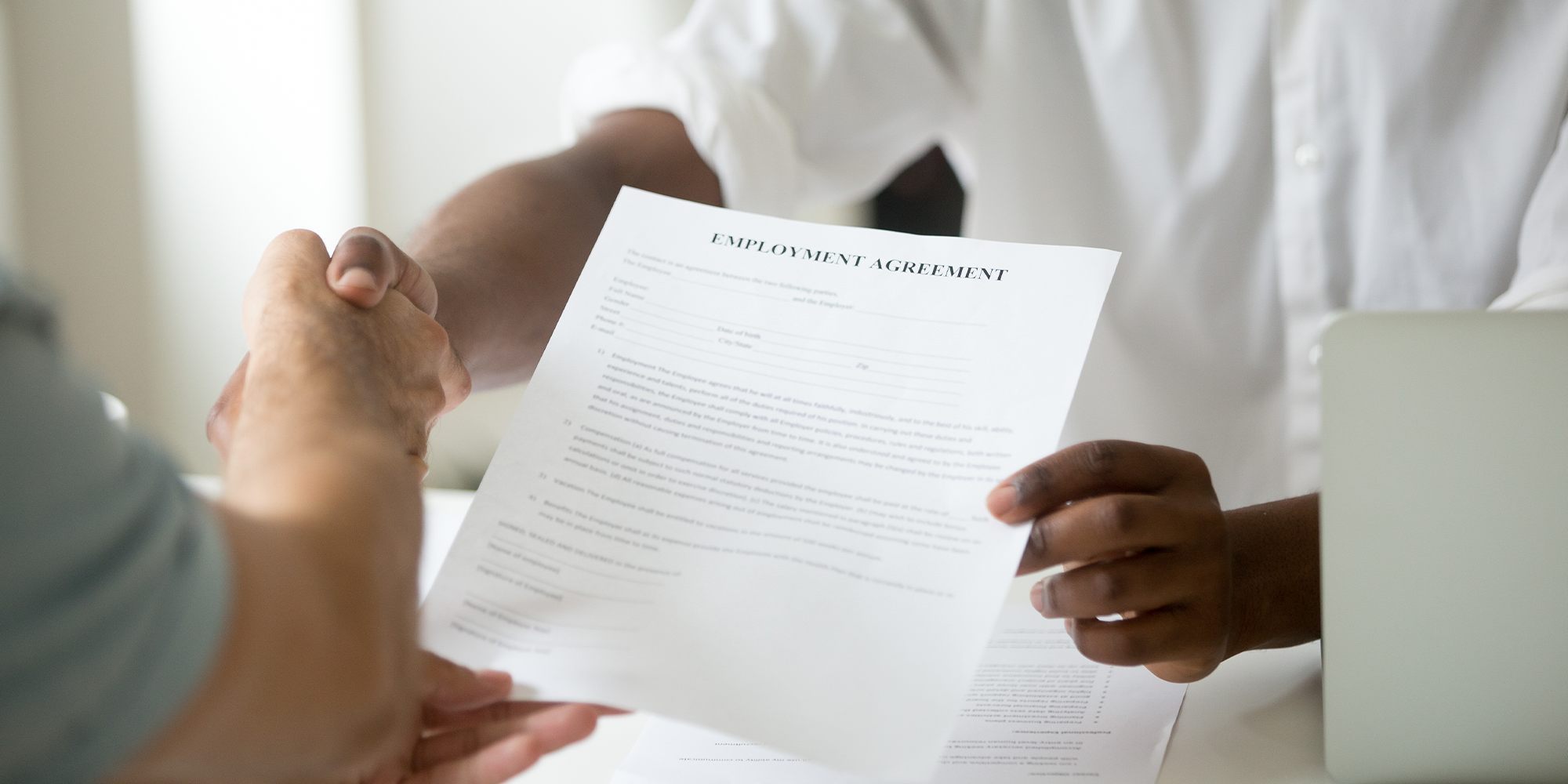 churches-continue-increase-lay-staff Job applicant shaking hands with interviewer
